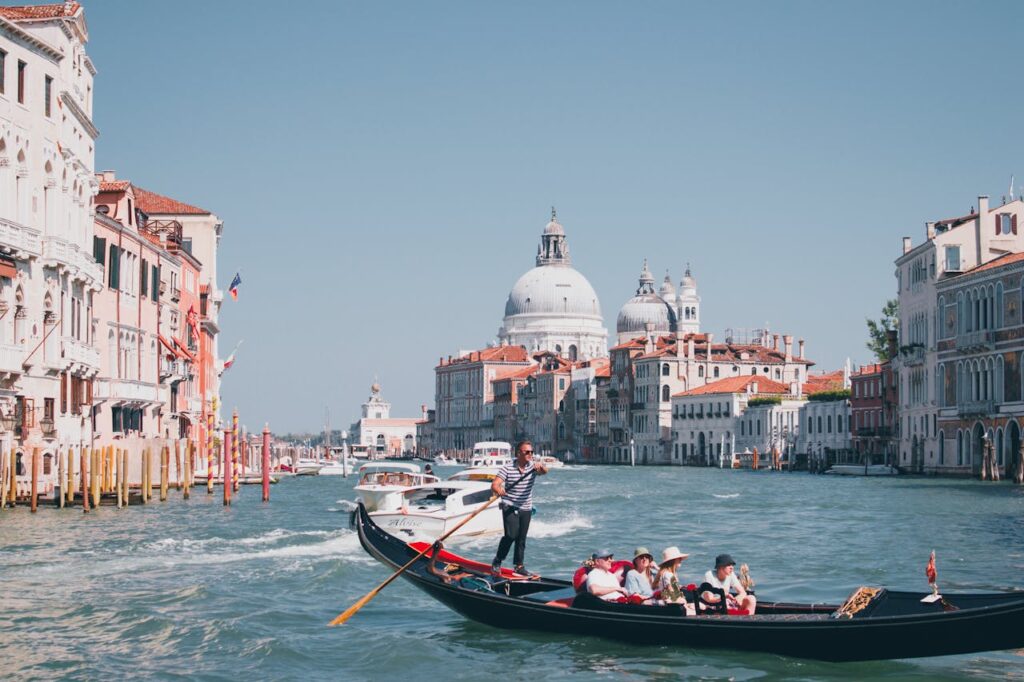A serene gondola ride on Venice's Canal Grande, capturing the city's iconic architecture.
